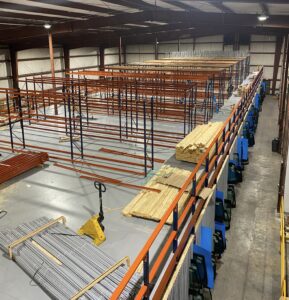 Pallet rack supported pick module installed in mobile, Alabama that included wide span shelving on the top level.