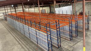 Pallet rack supported pick module installed in mobile, Alabama that included wide span shelving on the top level.