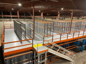Pallet rack supported pick module installed in mobile, Alabama that included wide span shelving on the top level.