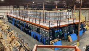 Pallet rack supported pick module installed in mobile, Alabama that included wide span shelving on the top level.