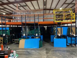 Pallet rack supported pick module installed in mobile, Alabama that included wide span shelving on the top level.