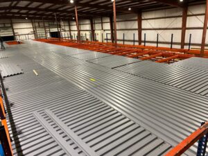 Pallet rack supported pick module installed in mobile, Alabama that included wide span shelving on the top level.