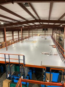 Pallet rack supported pick module installed in mobile, Alabama that included wide span shelving on the top level.