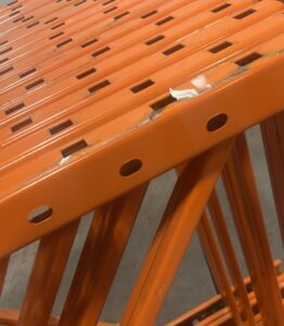 Close-up of Redirack pallet rack beam connectors and uprights from Canadian rack system