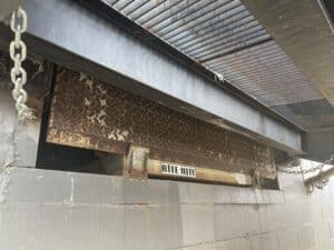 Copperloy- JH Industries steel ground to dock yard ramp installation over old dock leveler